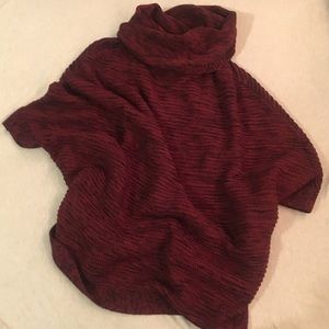 red turtleneck poncho sweater